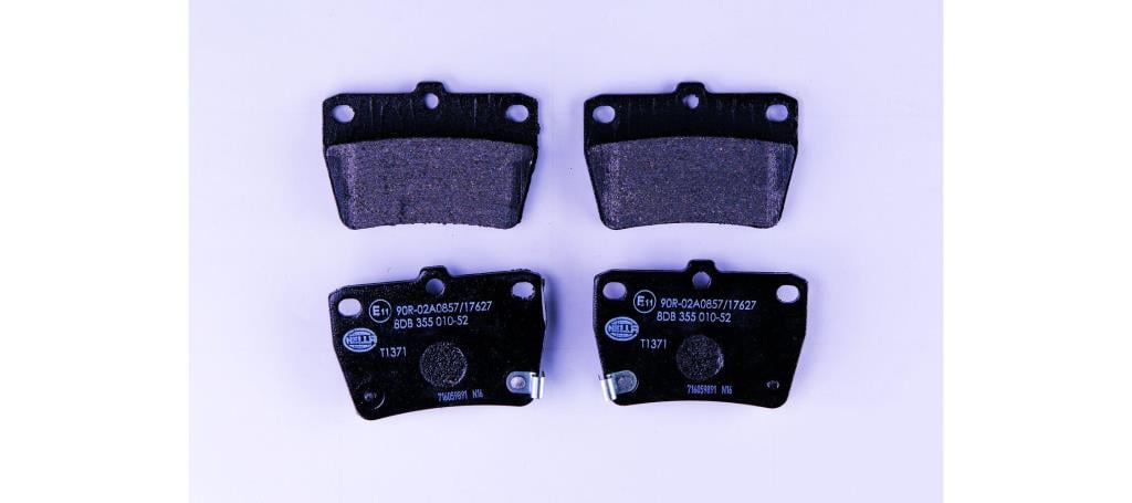 Jeu de 4 plaquettes de frein HELLA ref. 8DB 355 010-521
